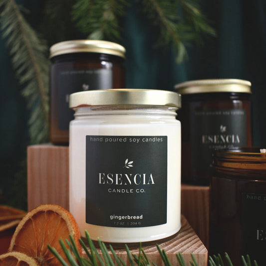 Esecncia Candle Co. gingerbread candle with other candles in the background